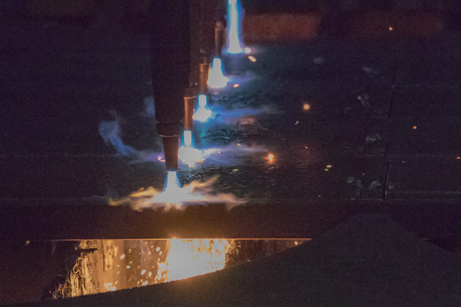flame cutting through steel